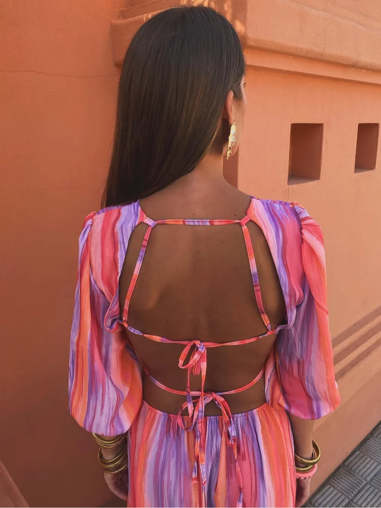 Women's red, pink and purple striped maxi dress with side waist cut-outs and short sleeves