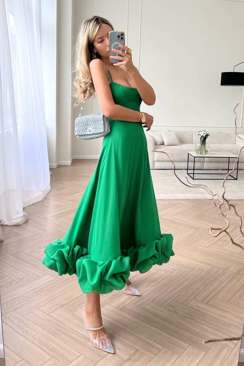 Women's sleeveless maxi dress with fitted bodice and ruffled hem