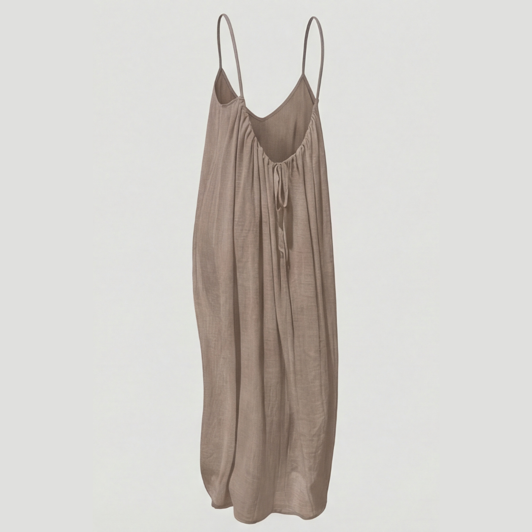 Women's flowing backless maxi dress with V-neckline and spaghetti straps
