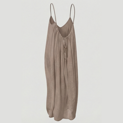 Women's flowing backless maxi dress with V-neckline and spaghetti straps