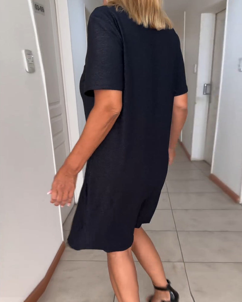 Women's black knee-length dress with V-neck, short sleeves and twist front