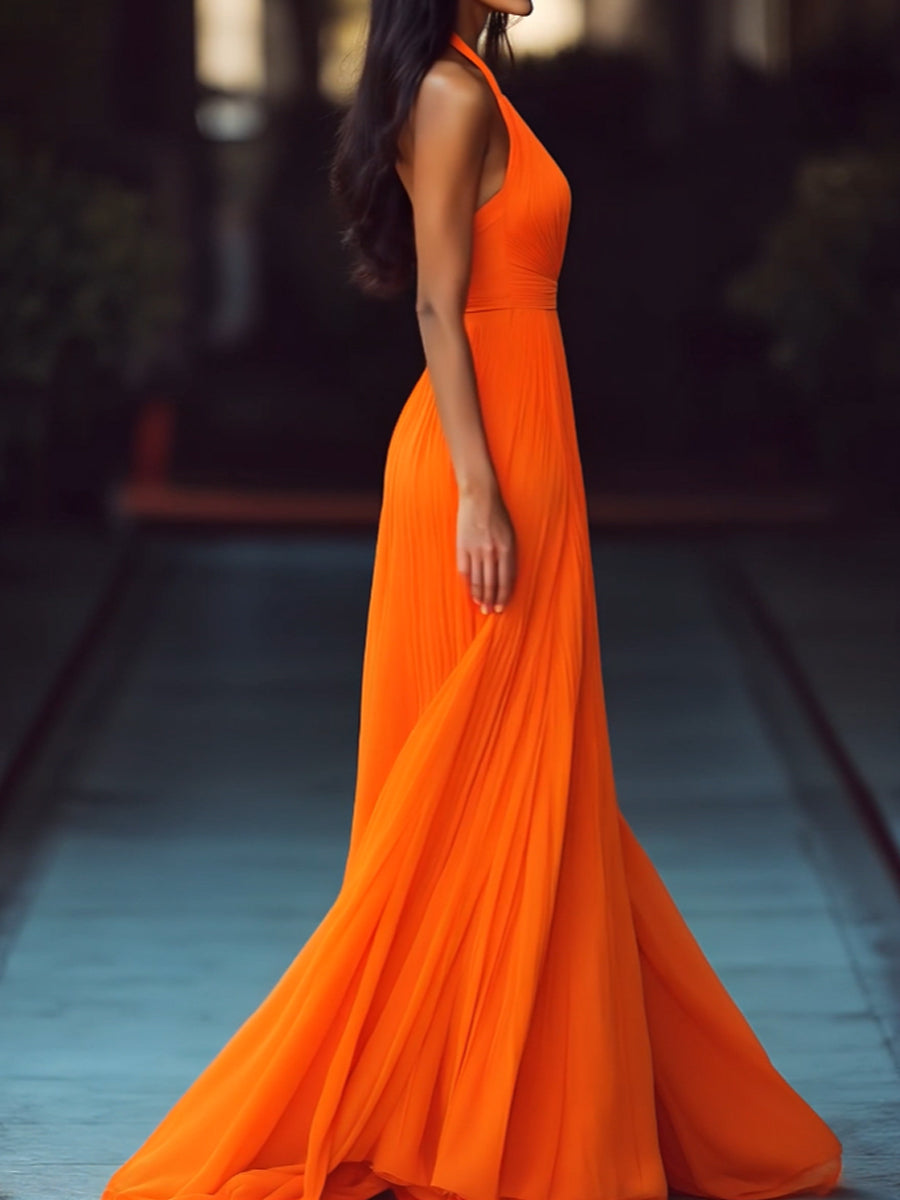 Women's orange pleated halter maxi dress with deep V-neckline and floor-length skirt