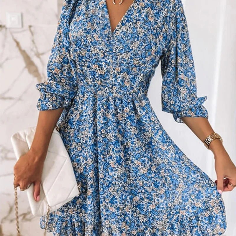 Women's floral V-neck mini dress with 3/4 sleeves and smocked waist