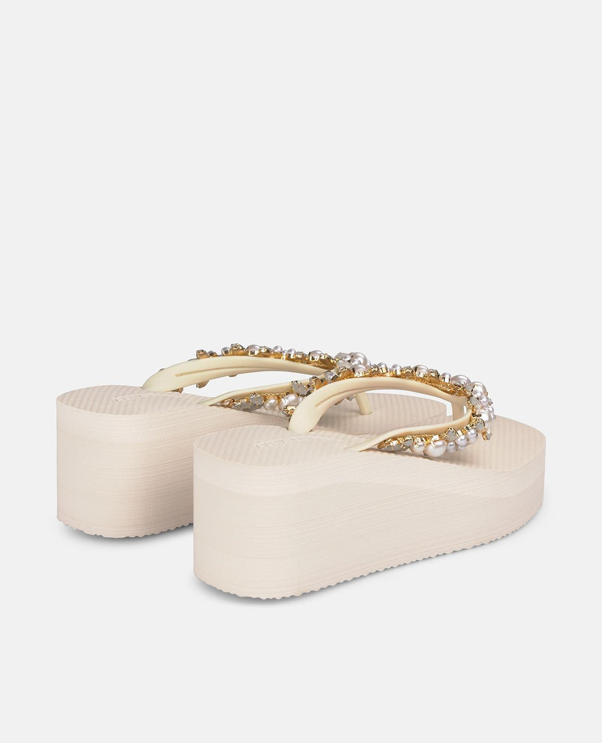 Beige platform flip-flop sandals with pearl embellishment