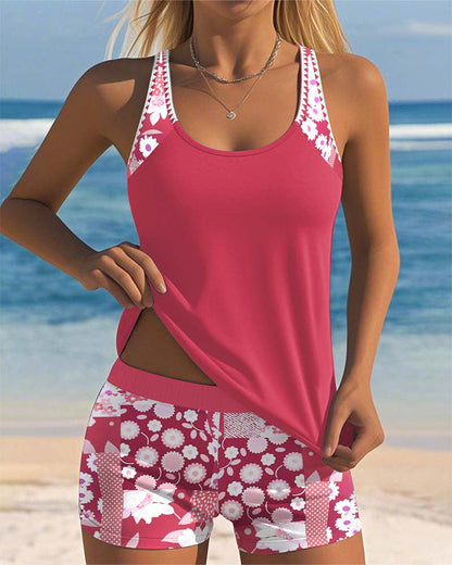 Women's floral tankini swimsuit with sleeveless top and matching shorts