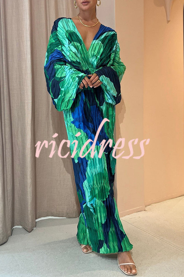 Women's green abstract print maxi dress with V-neck, kimono sleeves and front split