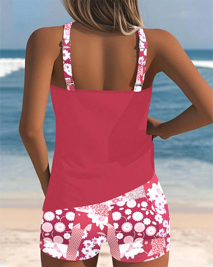 Women's floral two-piece swimsuit with sleeveless top and patterned shorts
