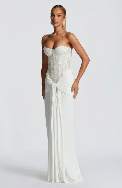 Women's strapless sequined maxi dress with sweetheart neckline and draped floor-length skirt