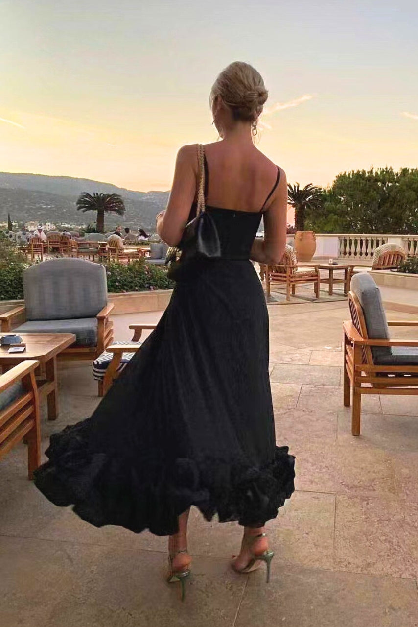 Women's sleeveless maxi dress with fitted bodice and ruffled hem