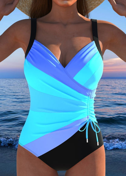 Women's printed surplice swimsuit with V-neck, ruched waist and shorts-style coverage