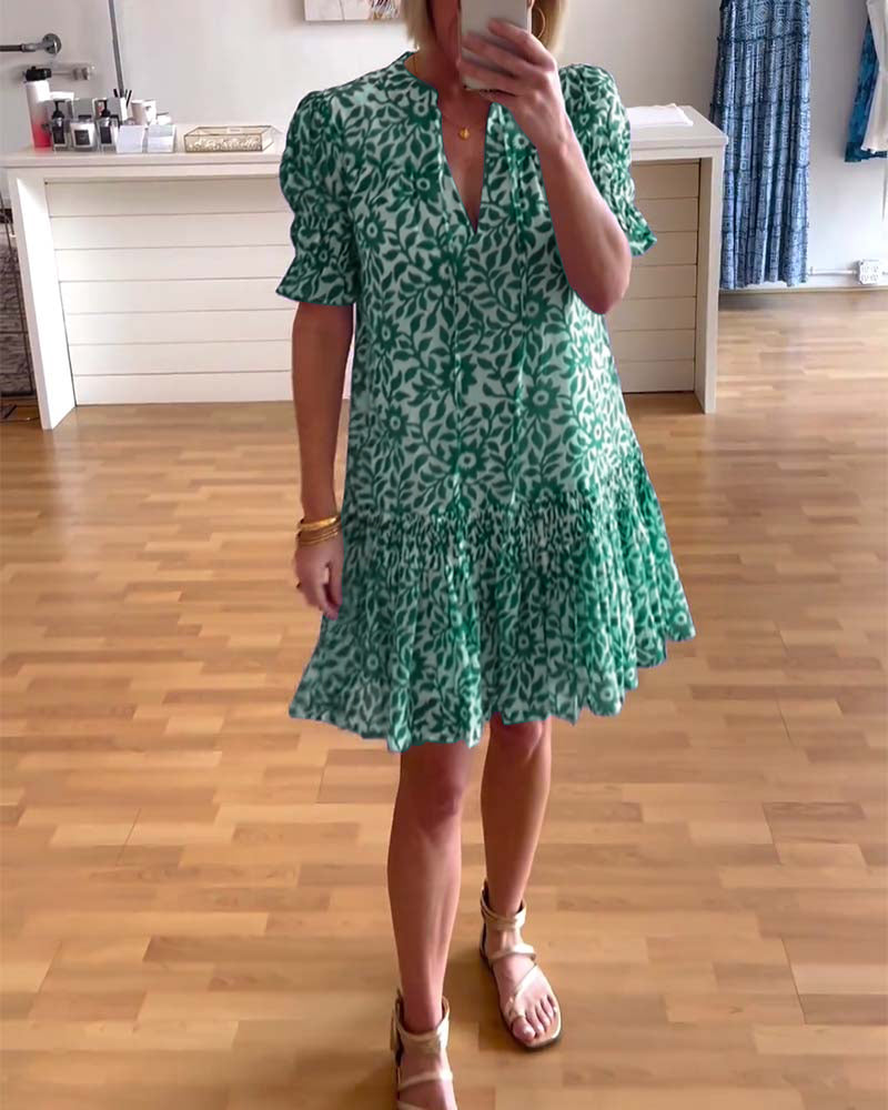Women's floral mini dress with V-neck, puff sleeves and tiered skirt