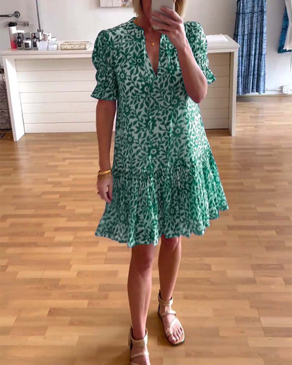 Women's floral mini dress with V-neck, puff sleeves and tiered skirt