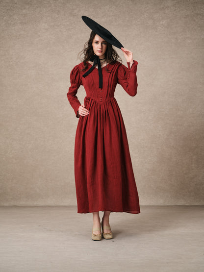 Women's tailored button-front corset maxi dress with long puff sleeves and a full gathered skirt