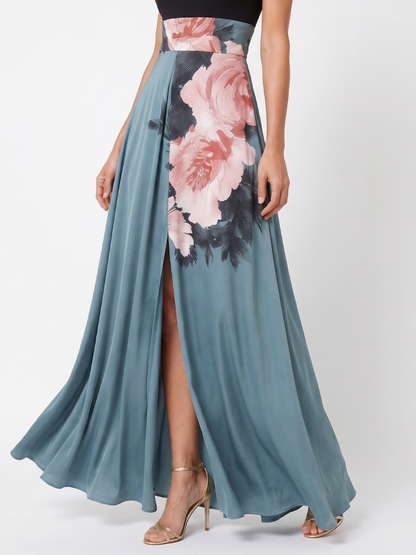 Women's floral halter maxi dress with sleeveless bodice and flowing split skirt