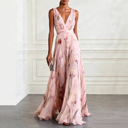 Women's sleeveless floral wrap maxi dress with a V-neckline and flowing full-length skirt