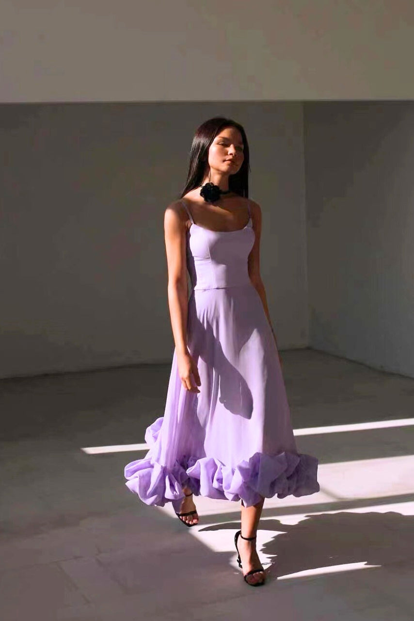 Women's sleeveless maxi dress with fitted bodice and ruffled hem