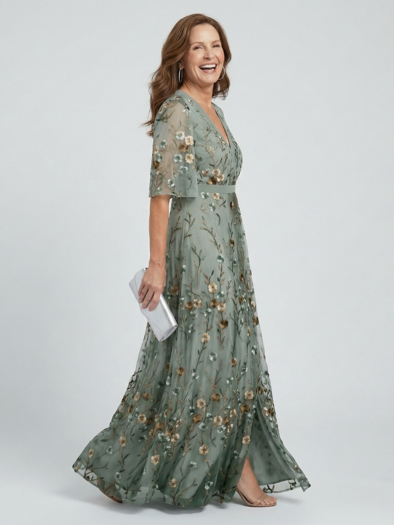 Women's green floral wrap maxi dress with V-neckline and flutter sleeves
