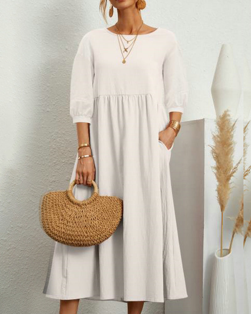 Women's plain A-line midi dress with round neck, 3/4 sleeves and side pockets