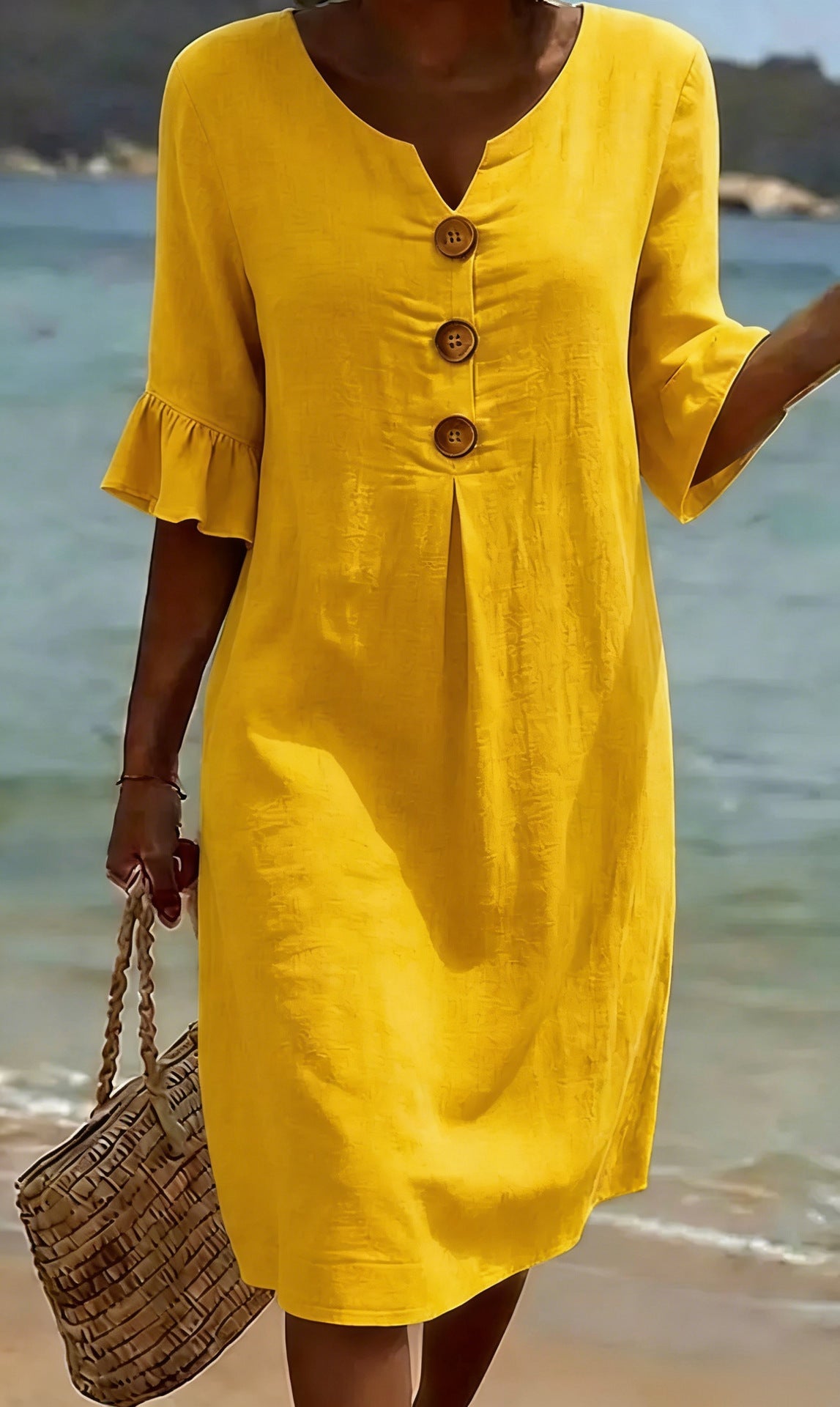 Women's relaxed knee-length button-front dress with split neckline and elbow-length sleeves