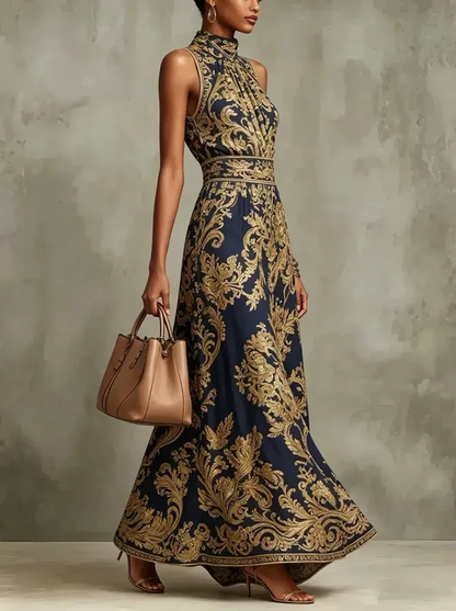 Women's sleeveless halter maxi dress with ornate baroque print and flowing skirt
