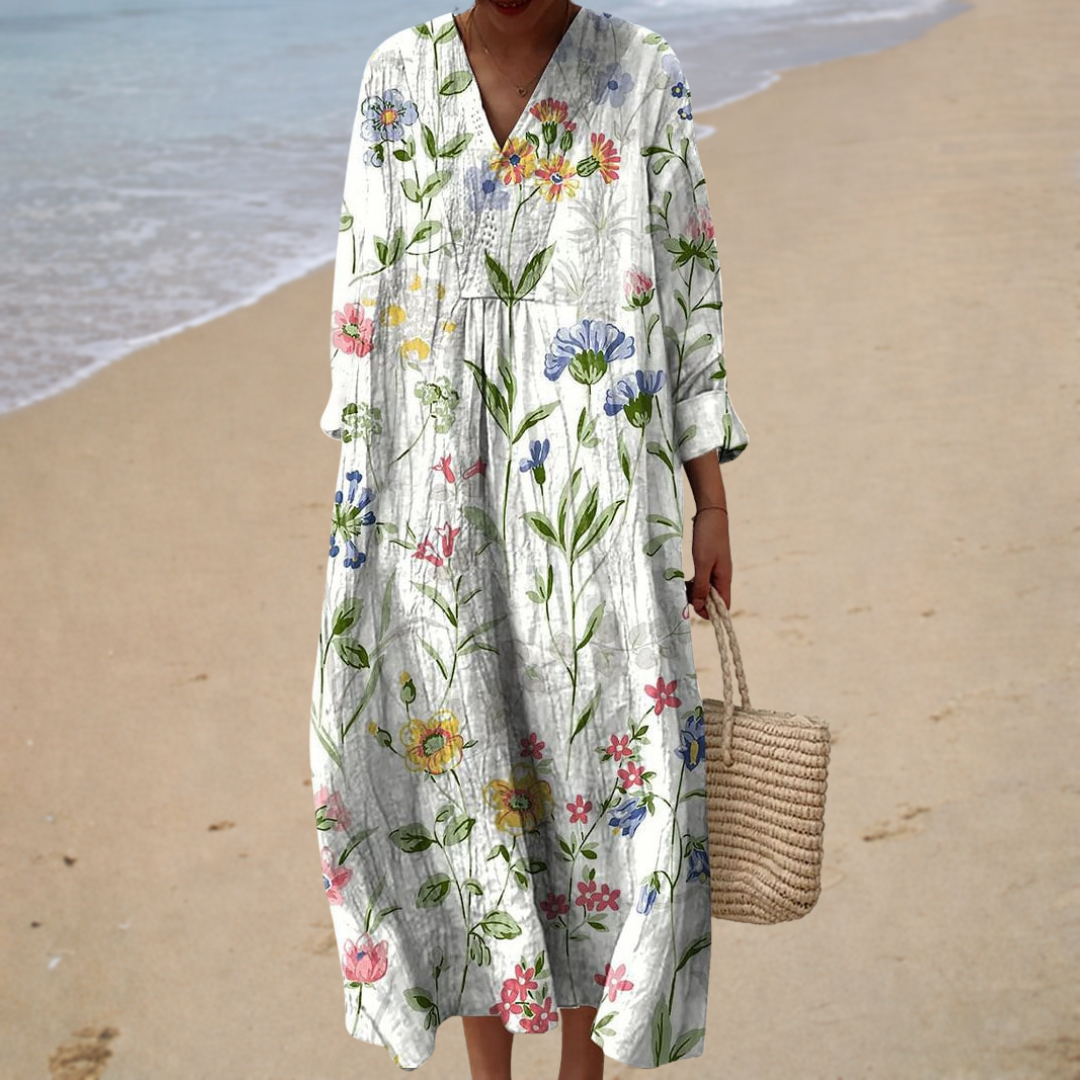 Women's white floral midi dress with V-neckline and long sleeves