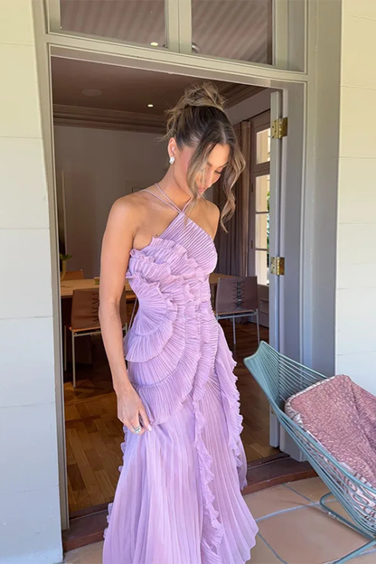 Women's sleeveless halter maxi dress with pleated bodice and layered ruffled high-low hem