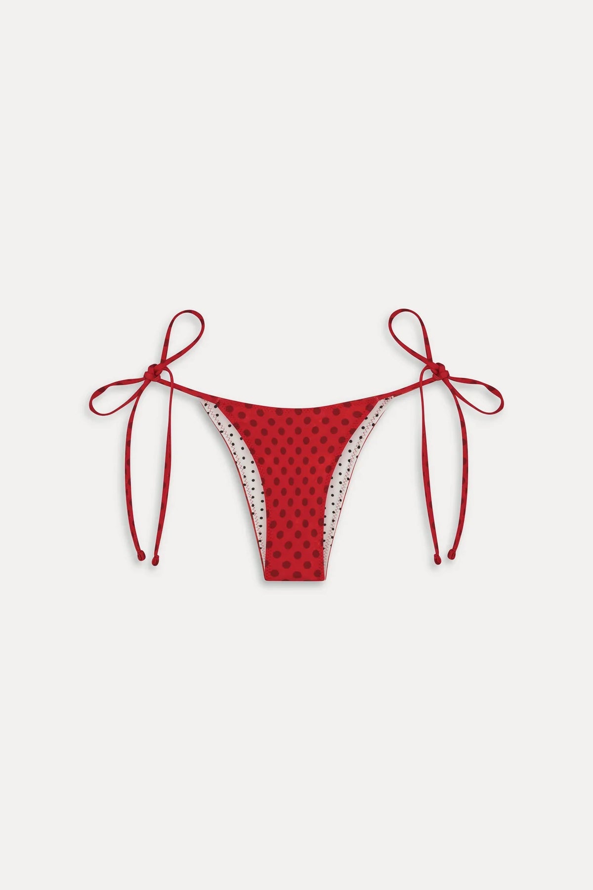 Women's reversible polka dot bikini bottoms with tie sides