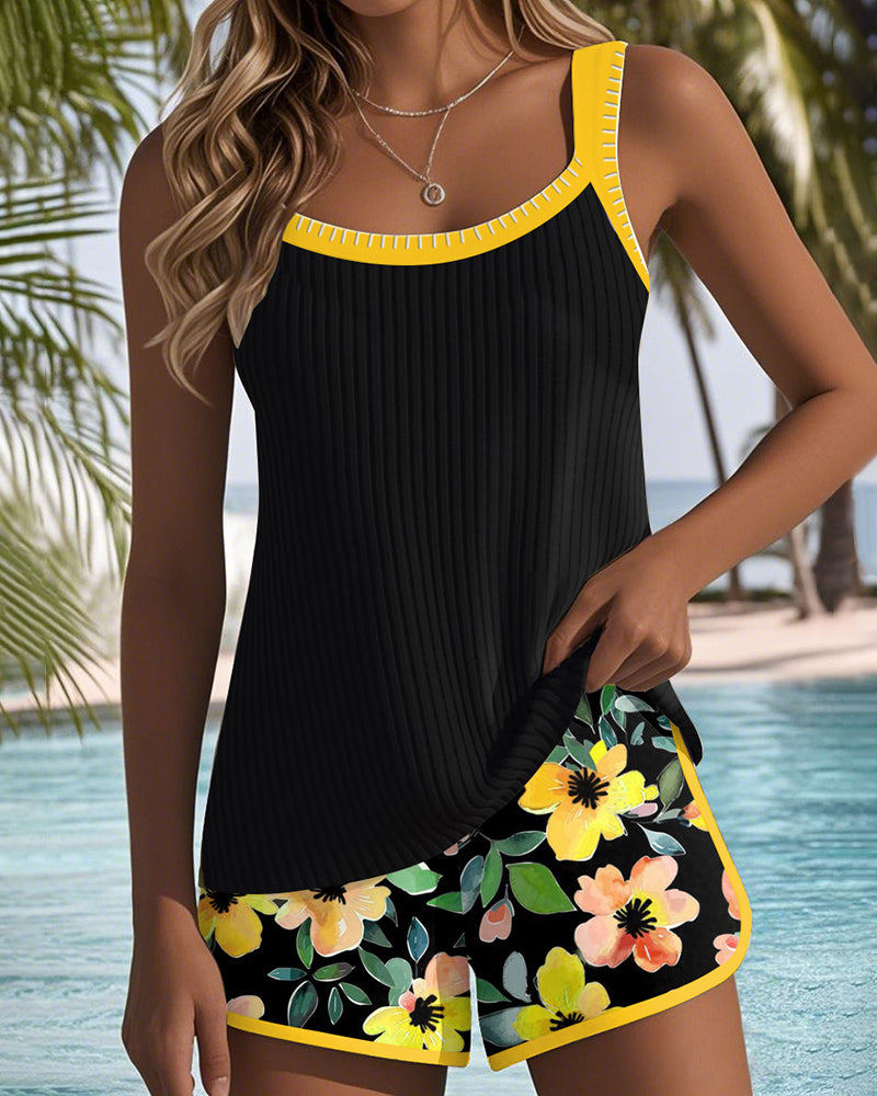 Women's floral tankini set with sleeveless ribbed top and swim shorts