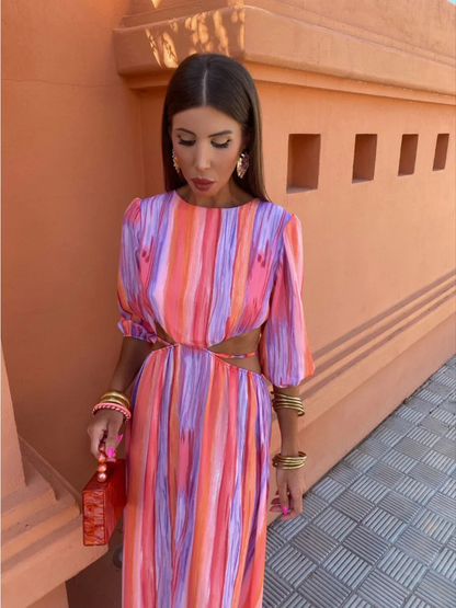 Women's red, pink and purple striped maxi dress with side waist cut-outs and short sleeves