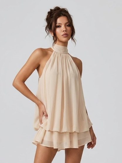 Women's sleeveless halter mini dress with high neck and tiered ruffle hem