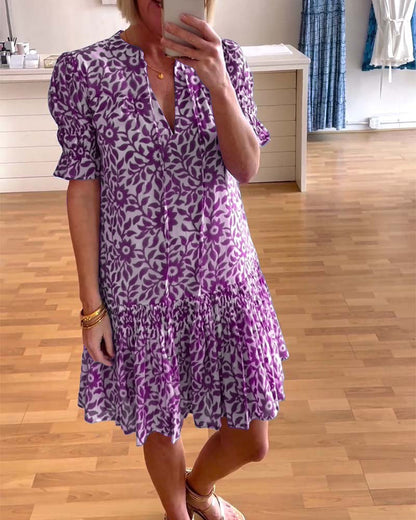 Women's floral mini dress with V-neck, puff sleeves and tiered skirt
