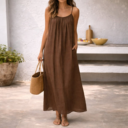 Women's long backless dress with spaghetti straps and tie detail