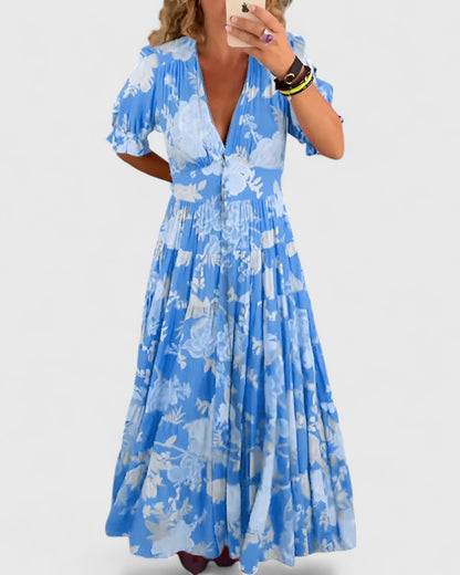 Women's floral V-neck maxi dress with short sleeves and a flowing skirt