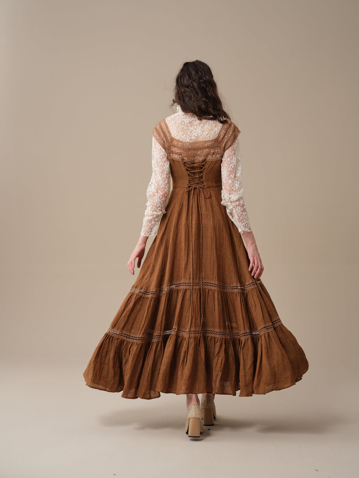 Women's lace-trimmed flared maxi dress with a tiered skirt