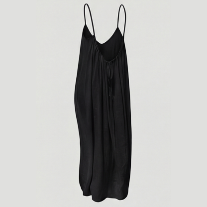 Women's flowing backless maxi dress with V-neckline and spaghetti straps