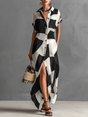 Women's black and white geometric maxi shirt dress with short sleeves and button front