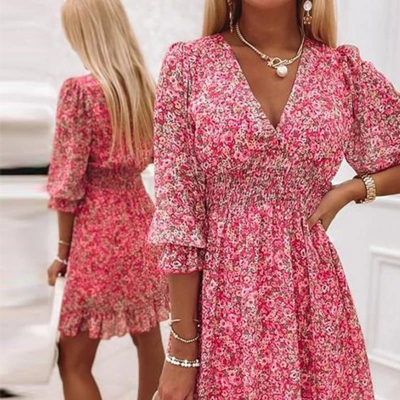 Women's floral V-neck mini dress with 3/4 sleeves and smocked waist