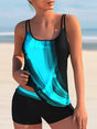 Women's plus size abstract printed tankini swimsuit with double spaghetti straps and black swim shorts