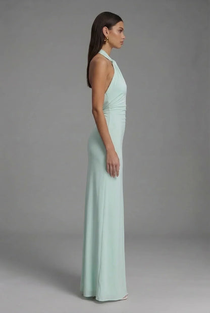 Women's fitted halter maxi dress with gathered ruching and floor-length skirt