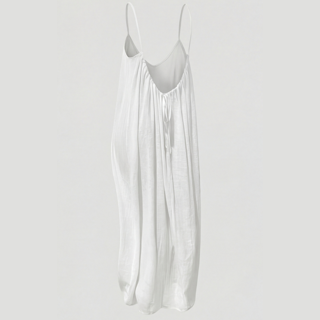 Women's flowing backless maxi dress with V-neckline and spaghetti straps