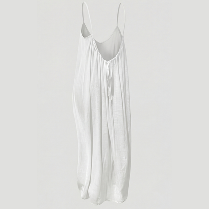 Women's flowing backless maxi dress with V-neckline and spaghetti straps
