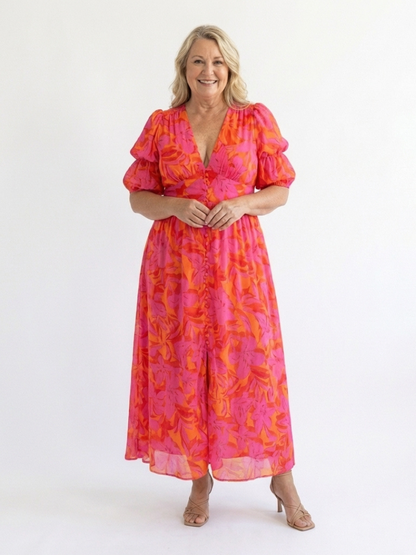 Women's pink floral midi dress with V-neck and short puff sleeves