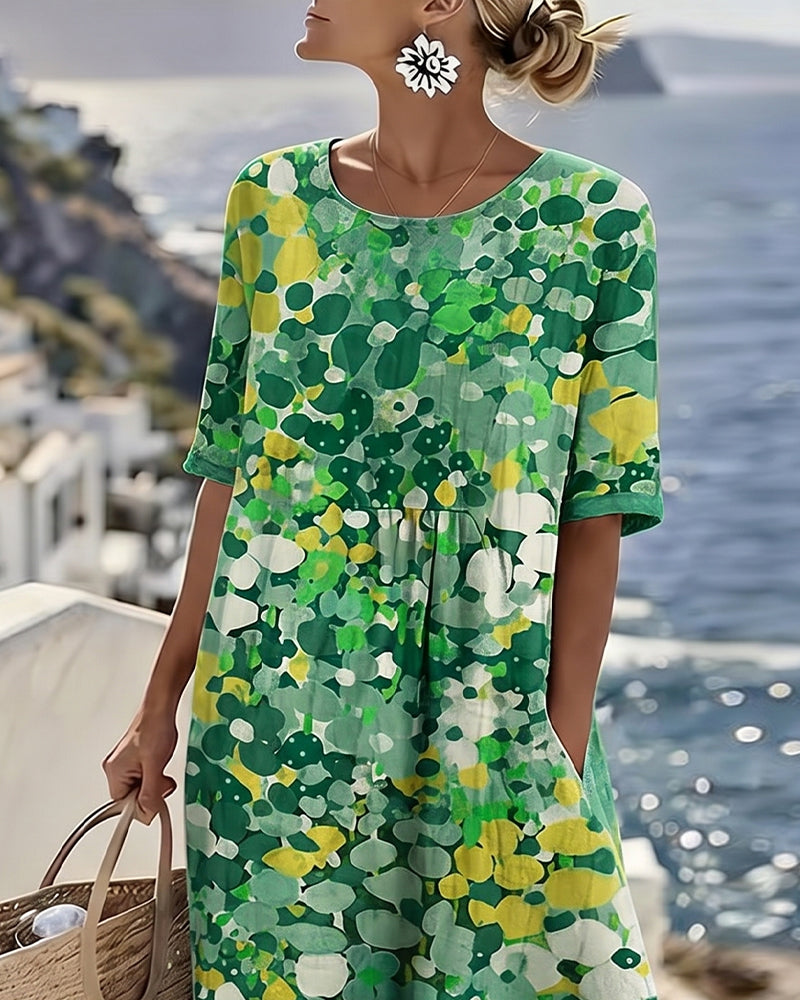 Women's colourful abstract print midi dress with round neckline and 3/4 sleeves