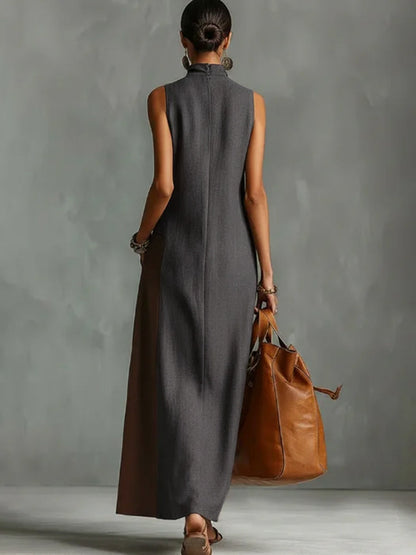 Women's sleeveless colour block maxi dress with mock neck, asymmetric hem and side pocket