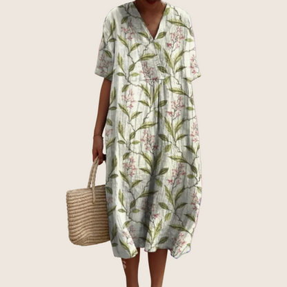Women's floral V-neck midi dress with short sleeves and button front