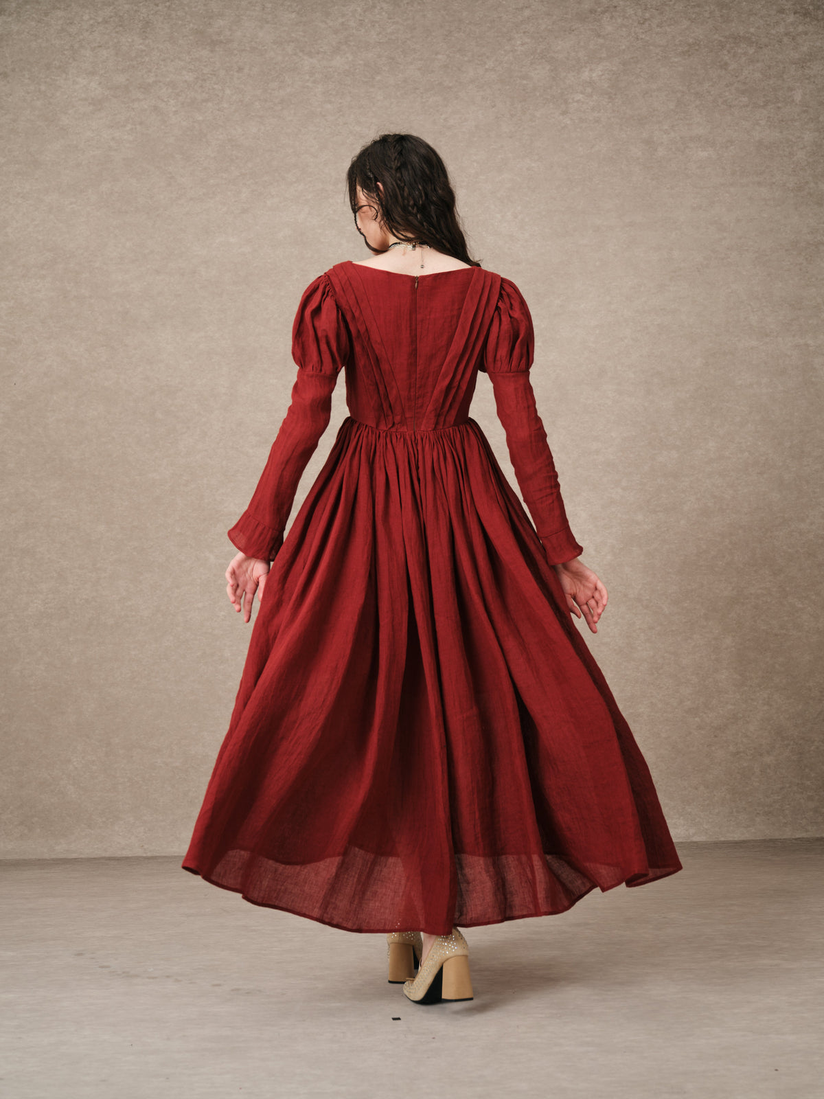 Women's tailored button-front corset maxi dress with long puff sleeves and a full gathered skirt
