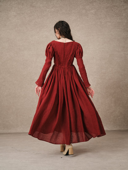 Women's tailored button-front corset maxi dress with long puff sleeves and a full gathered skirt