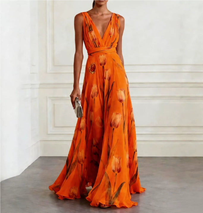 Women's sleeveless floral wrap maxi dress with a V-neckline and flowing full-length skirt