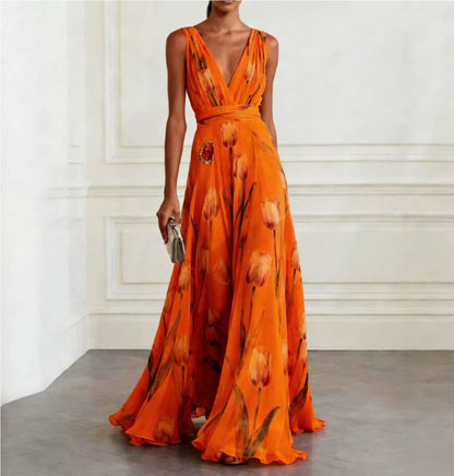 Women's sleeveless floral wrap maxi dress with a V-neckline and flowing full-length skirt