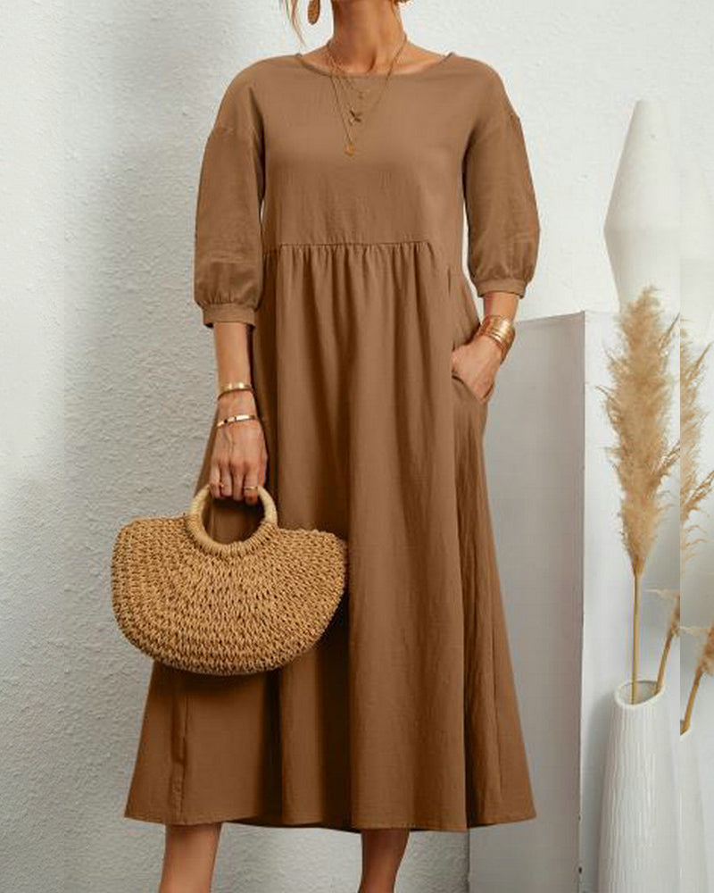 Women's plain A-line midi dress with round neck, 3/4 sleeves and side pockets